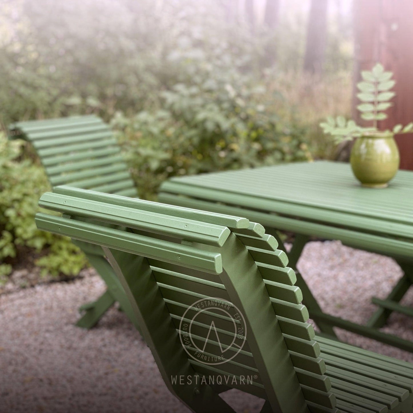 Green Sundborn garden furniture set with large wooden table for outdoor use